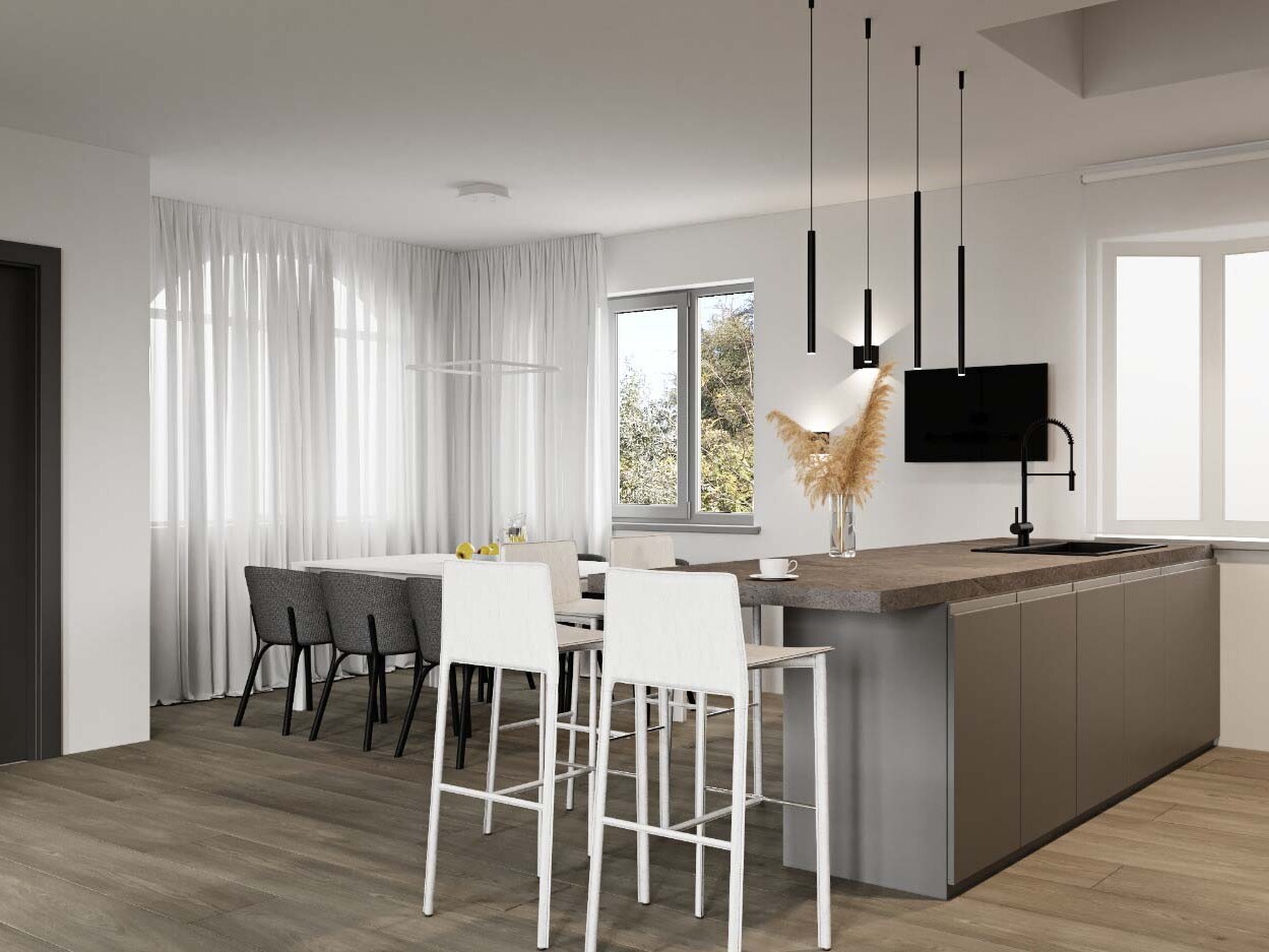 A room with chairs and a TV on the wall