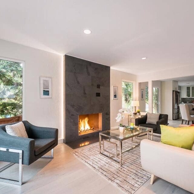 Spacious living room with a fireplace and sofa